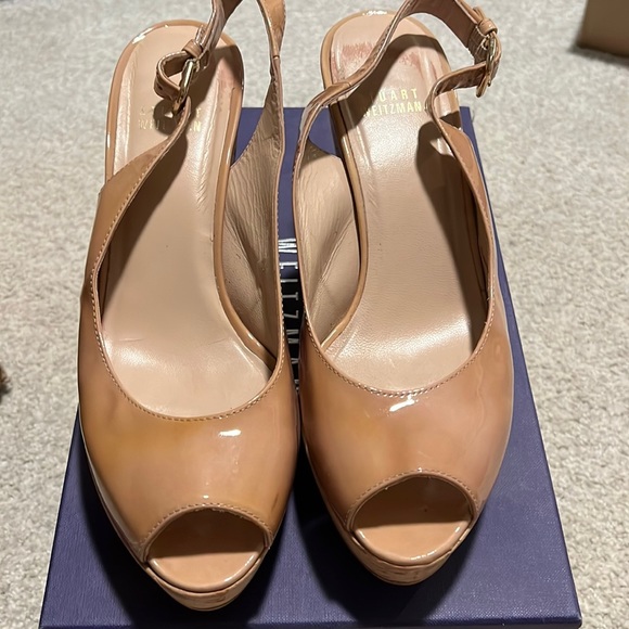 Stuart Weitzman Jean patent leather nude wedge. Worn a few times .